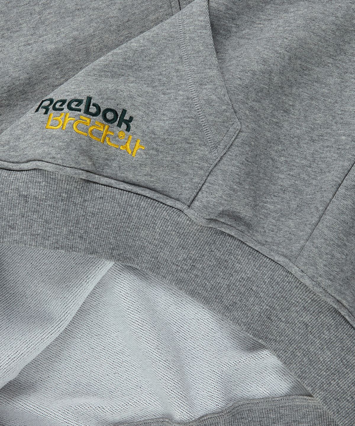 리복(REEBOK) [리복x발란사] 그래픽 후드 집업 - 그레이