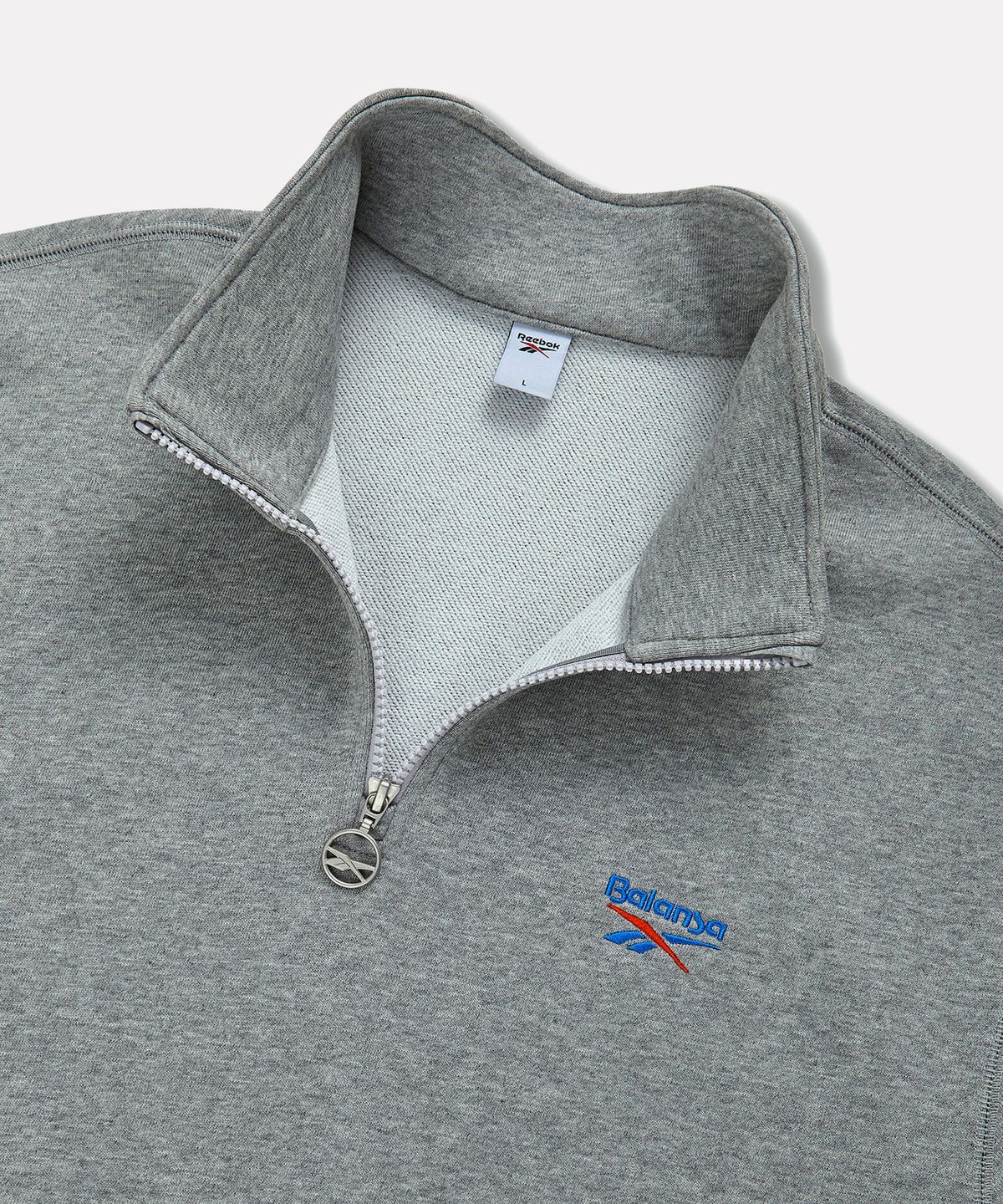 리복(REEBOK) [리복x발란사] 그래픽 하프 집업 - 그레이