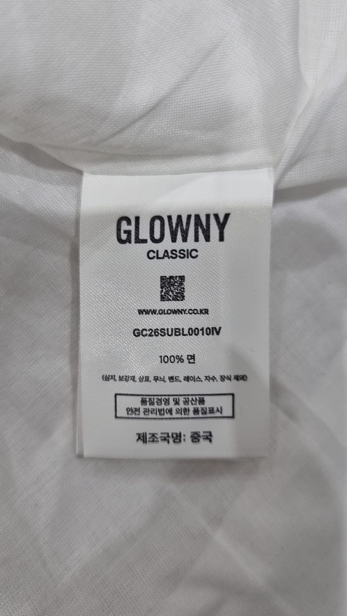 글로니(GLOWNY) G RUFFLED BUTTON BLOUSE (IVORY) L