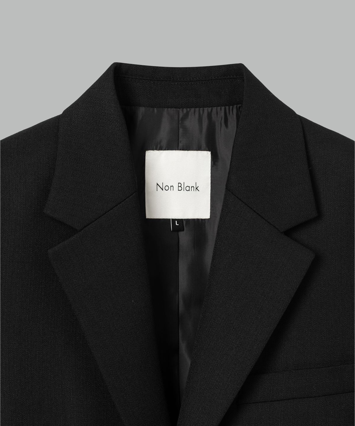 넌블랭크(NONBLANK) 울 블렌드 캔버스 루즈핏 자켓_BLACK