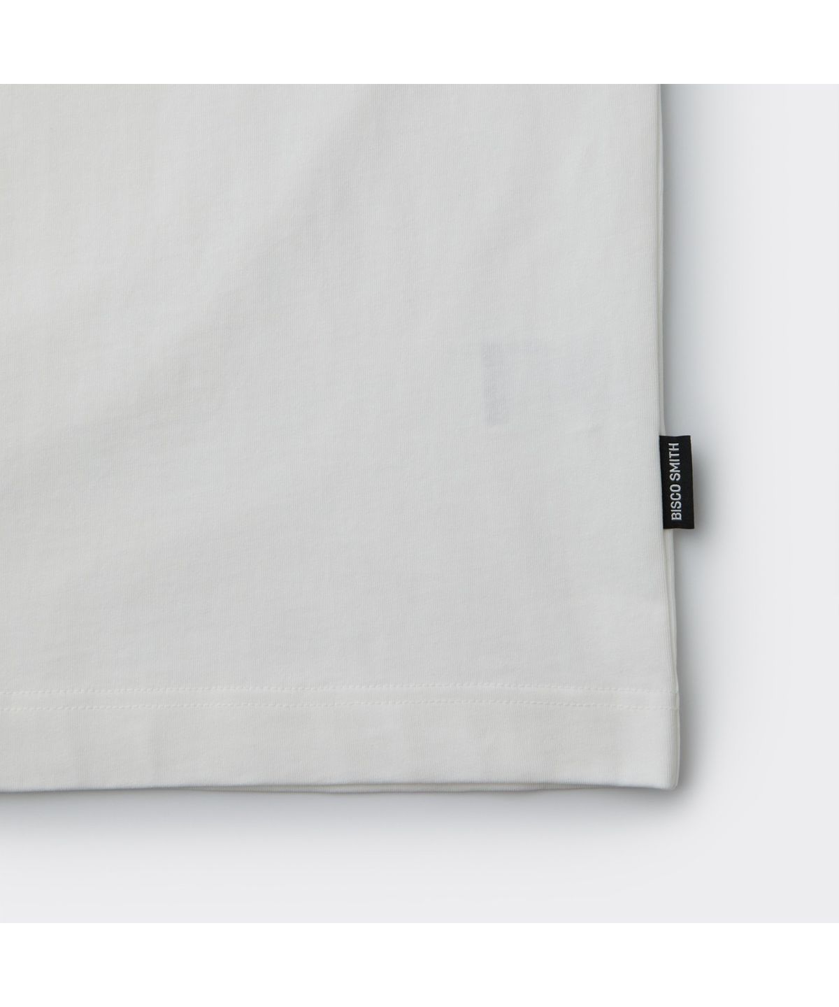 커스텀멜로우(CUSTOMELLOW) [BISCO SMITH] White Graphic T-shirt CWTAW25915WHX
