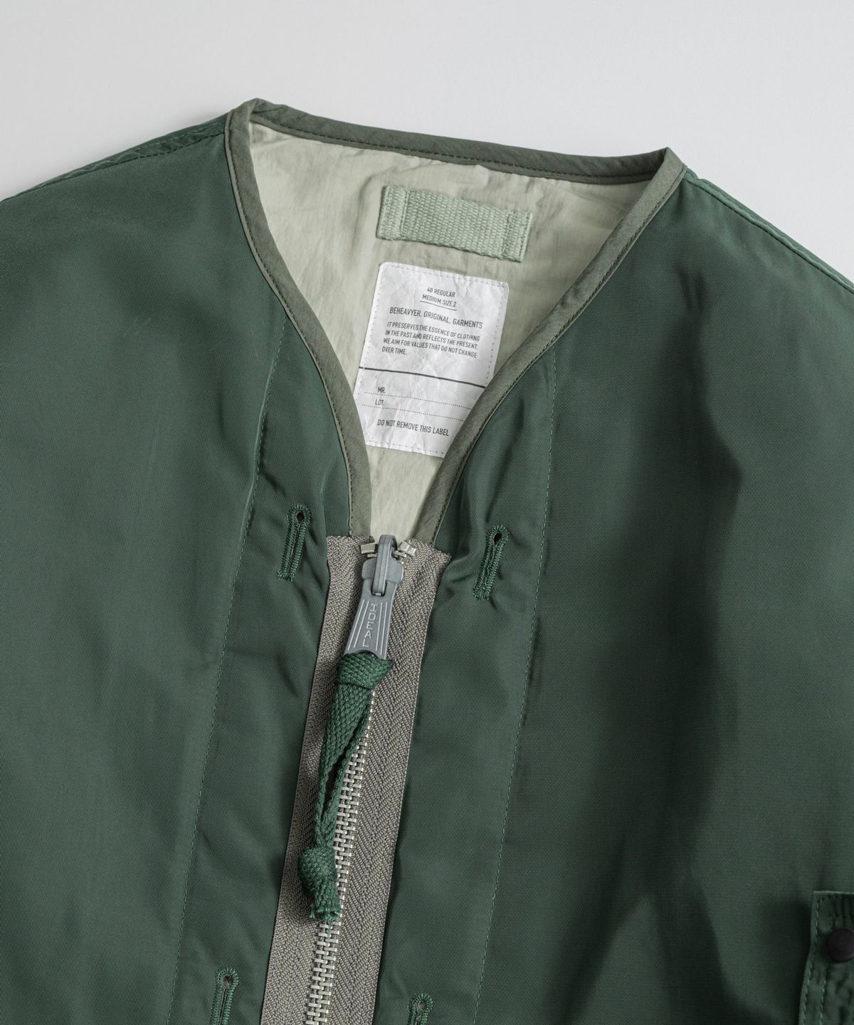 비헤비어(BEHEAVYER) REVERSIBLE MIL LINER JACKET b.green/l.olive