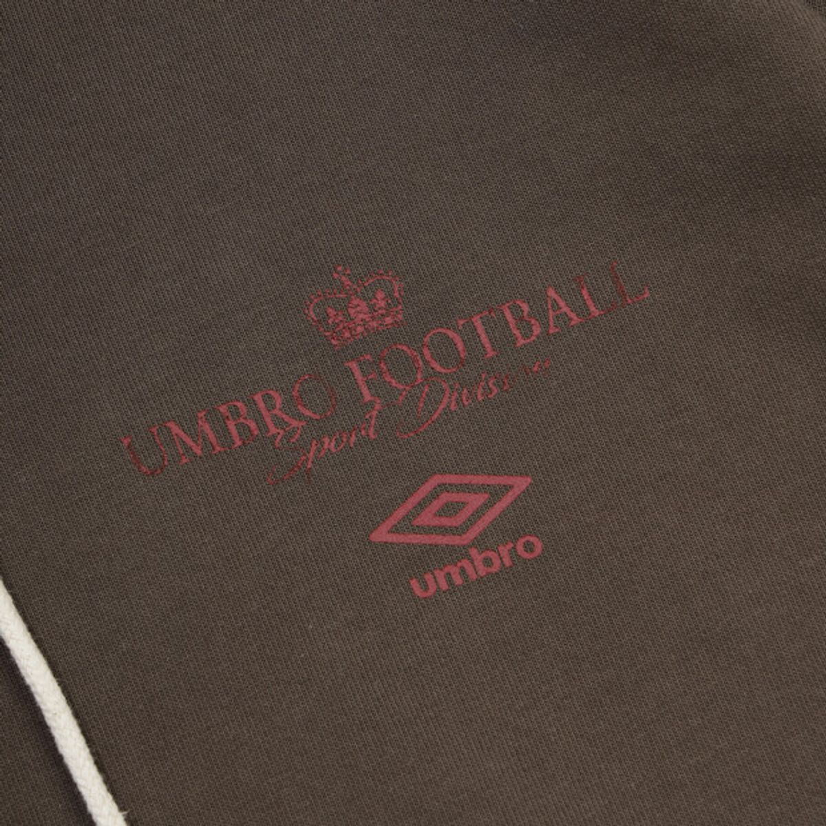 엄브로(UMBRO) 더비클럽 헨리넥 후드 티셔츠 브라운 UR311CHD93