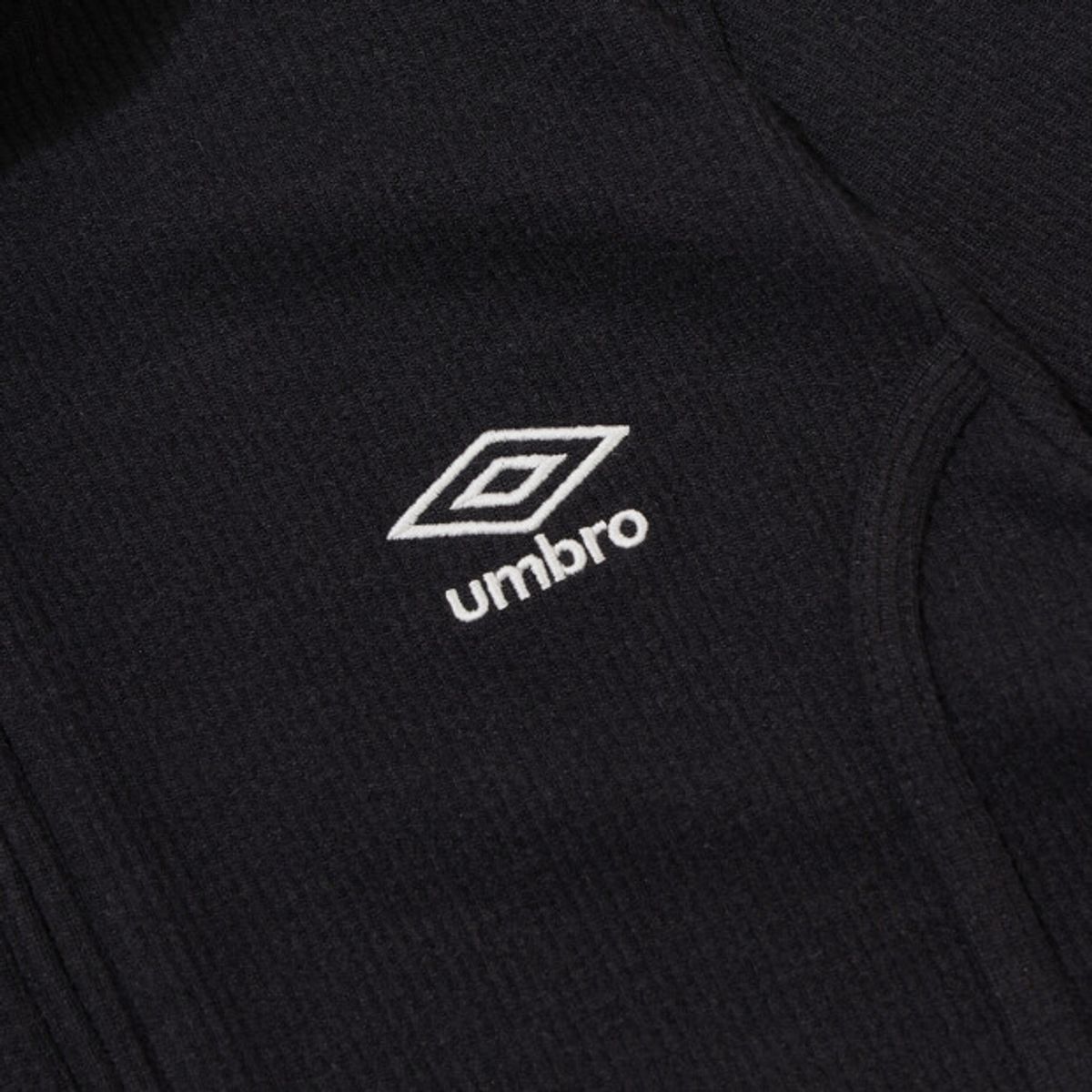 엄브로(UMBRO) 우먼스 골지 스탠넥 집업 자켓 블랙 UR322CFT99