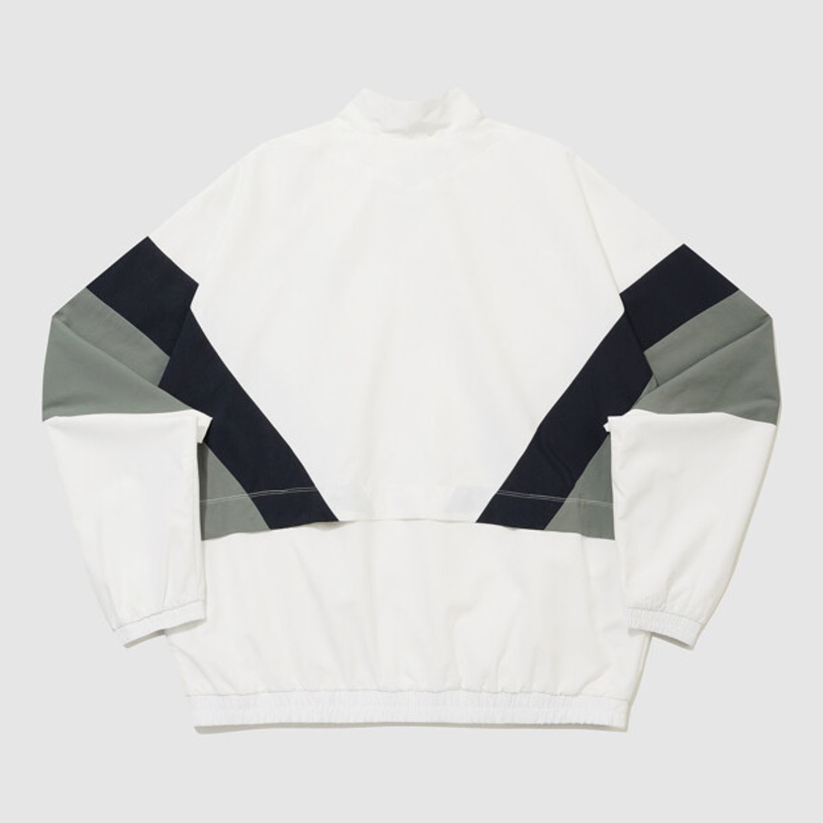엄브로(UMBRO) 더비클럽 컬러블럭 스탠넥 바람막이 자켓 아이보리 UR324CJK94