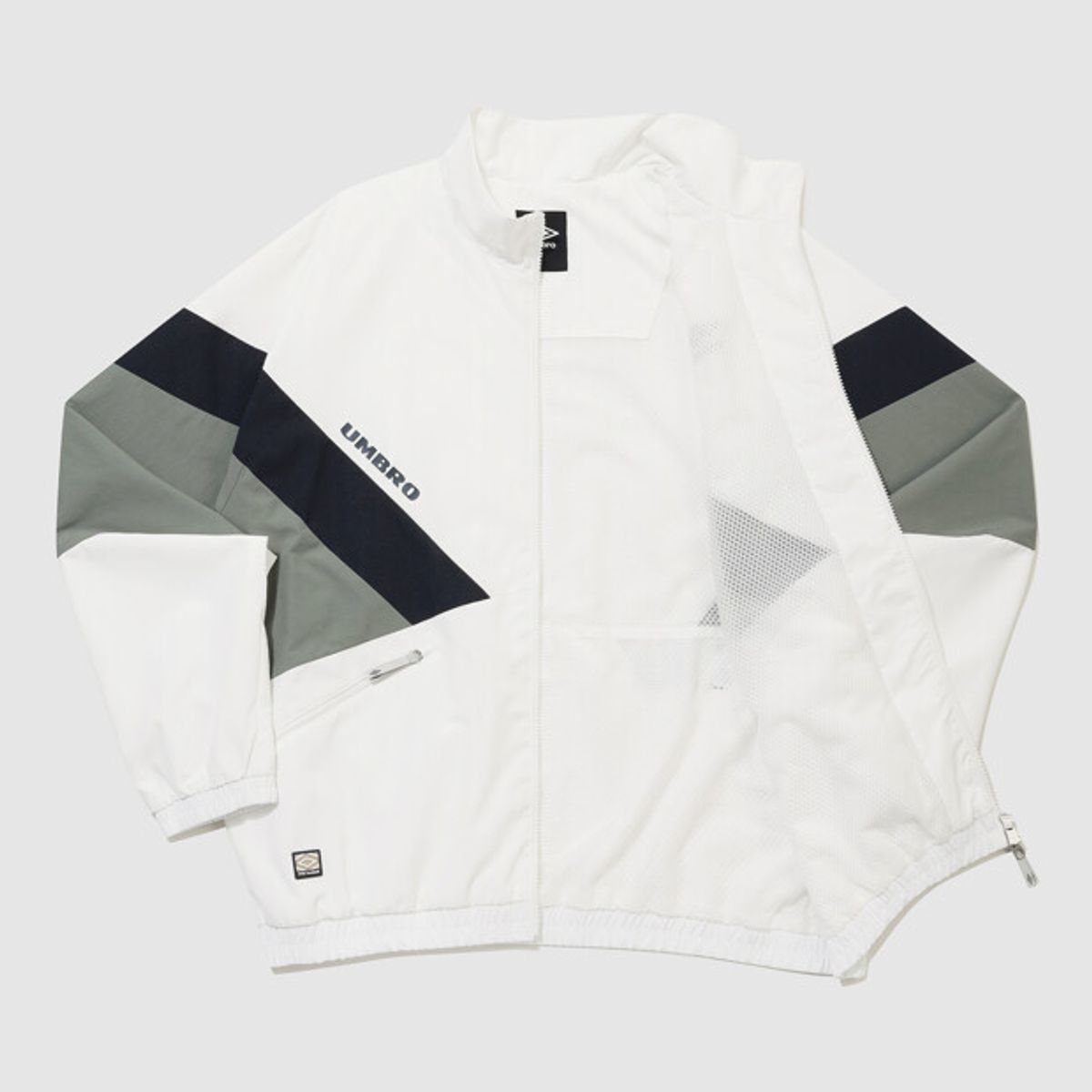 엄브로(UMBRO) 더비클럽 컬러블럭 스탠넥 바람막이 자켓 아이보리 UR324CJK94