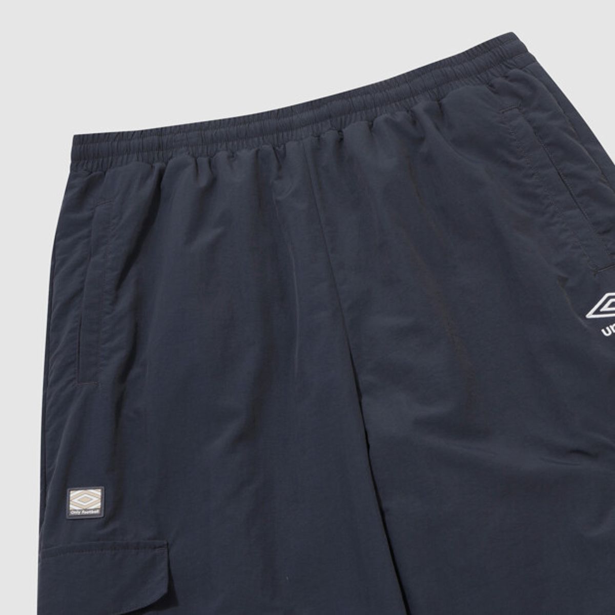 엄브로(UMBRO) 더비클럽 기모 안감 조거 & 와이드 2WAY 카고 팬츠 네이비 UR321CPT95