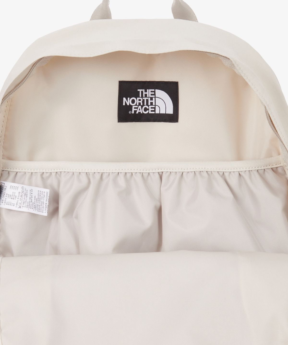 노스페이스(THE NORTH FACE) NM2DS55C 미니샷 엔더블유 WHITE SAND