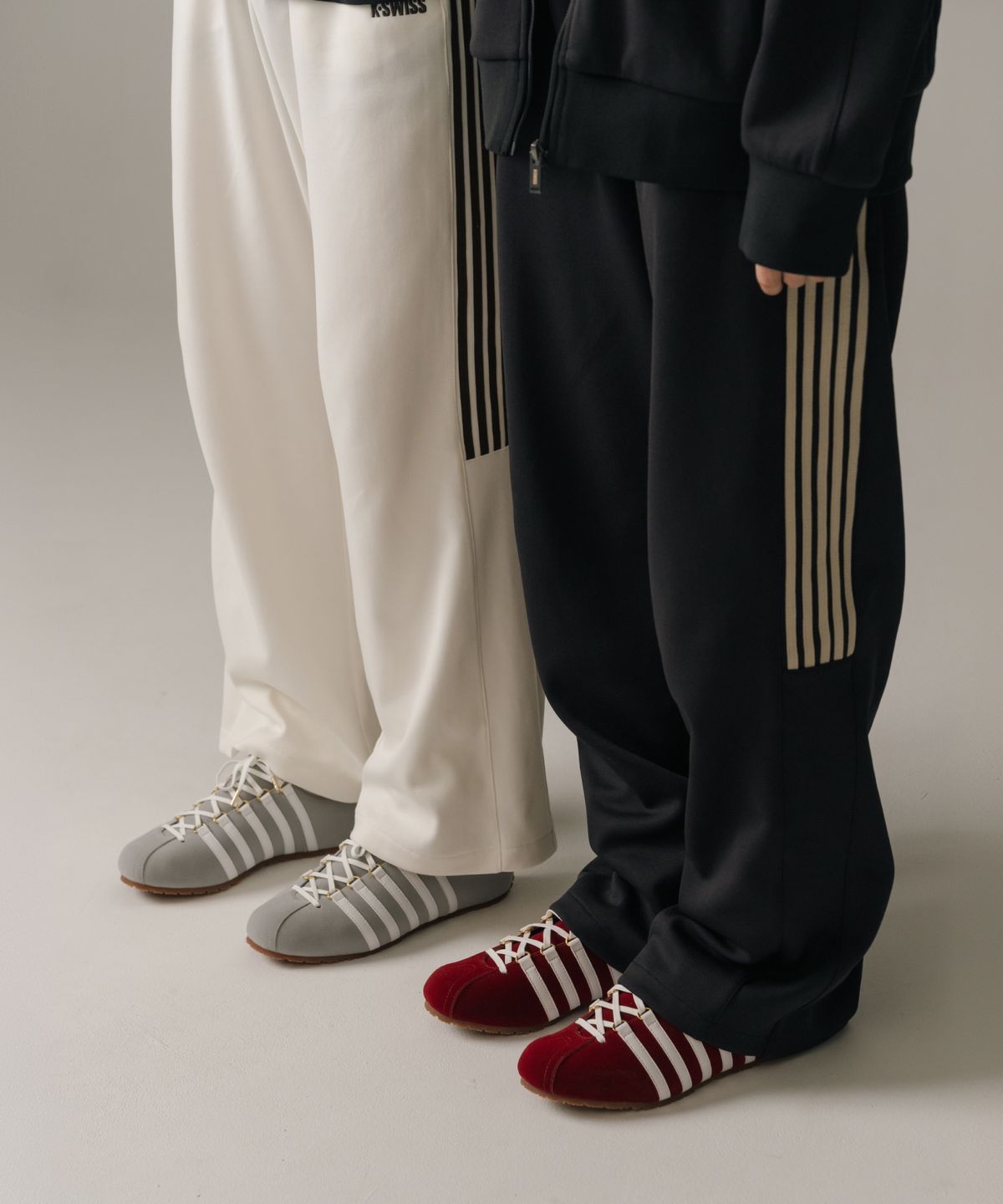 케이스위스(K-SWISS) 5 스트라이프 트랙 팬츠_1KSTPFV901BK
