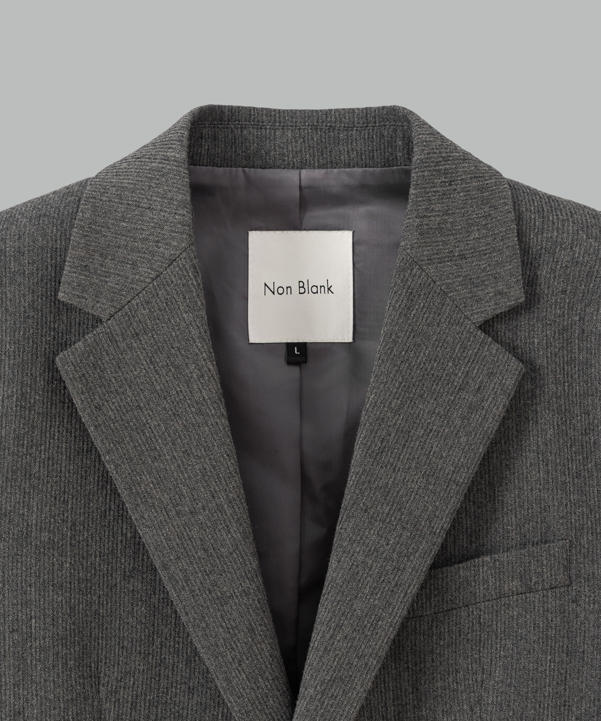 넌블랭크(NONBLANK) 울 블렌드 리브드 세미오버핏 블레이저_GREY