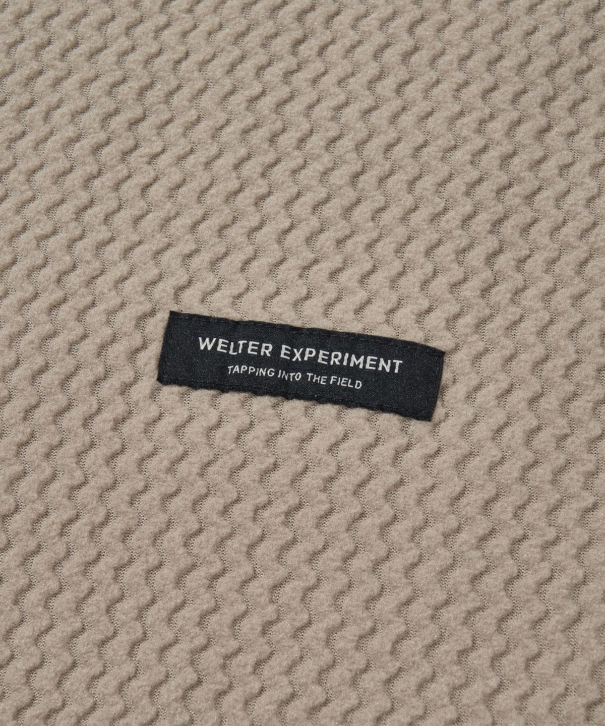 웰터 익스페리먼트(WELTER EXPERIMENT) 칼로라 플리스 후디드 풀오버 베이지