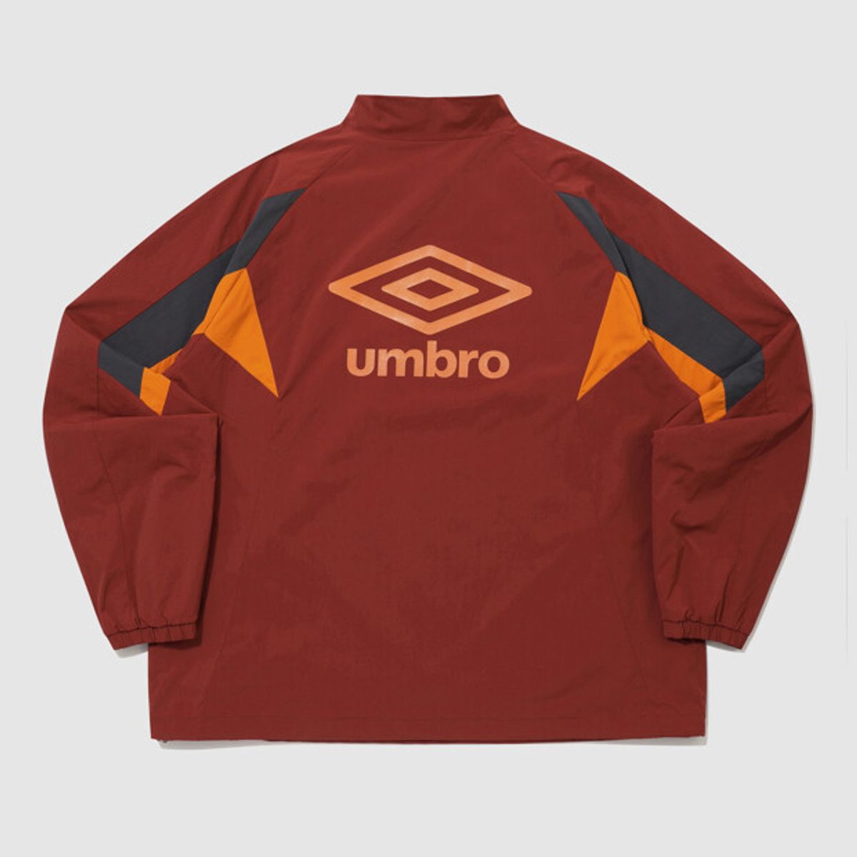 엄브로(UMBRO) 아이코닉 웜업 스탠넥 아노락 레드 UR321SWT99