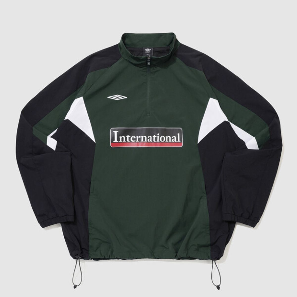 엄브로(UMBRO) 아이코닉 웜업 스탠넥 아노락 그린 UR321SWT99