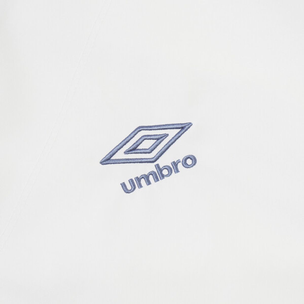 엄브로(UMBRO) 더비클럽 컬러블럭 후드형 아노락 아이보리 UR324CWT95