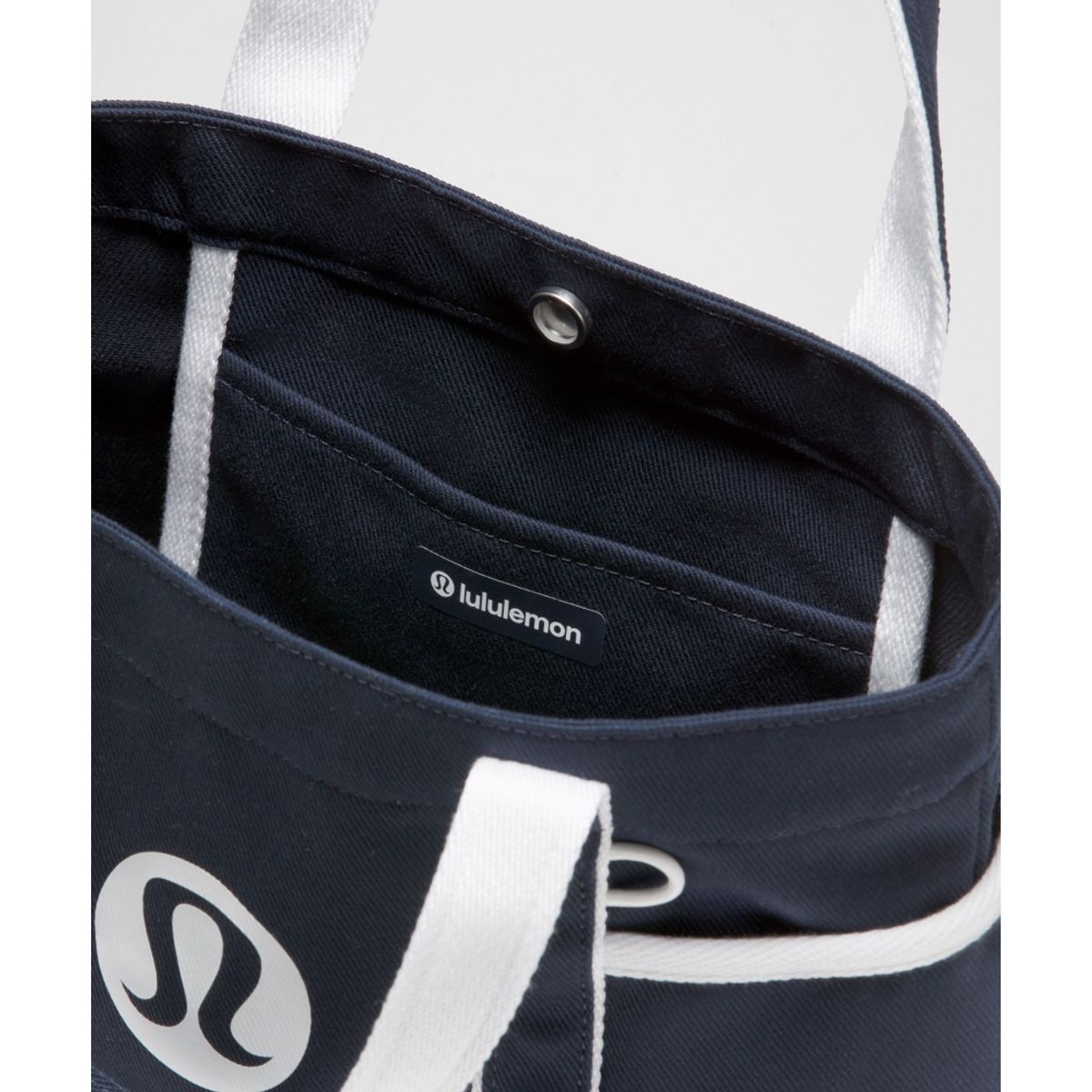룰루레몬(LULULEMON) 데일리 멀티 포켓 미니 캔버스 토트백 6.5L  TRNV WHT