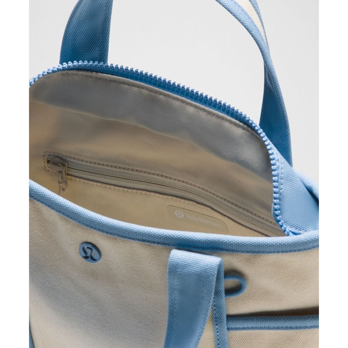 룰루레몬(LULULEMON) 데일리 멀티 포켓 스몰 집 탑 토트백 5L  NAT DEAM