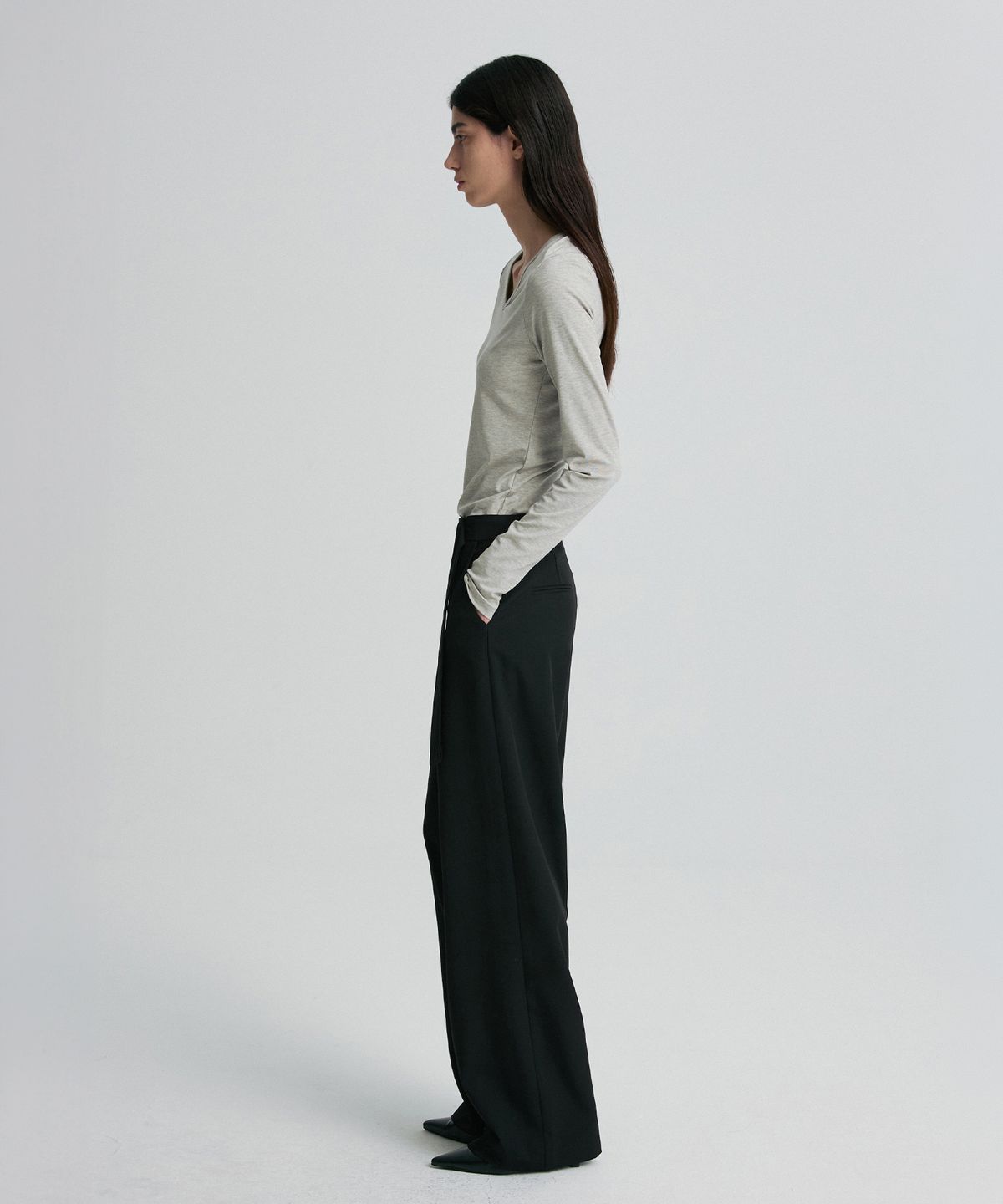 리이(RE RHEE) ASYMMETRIC ZIP TROUSERS BLACK
