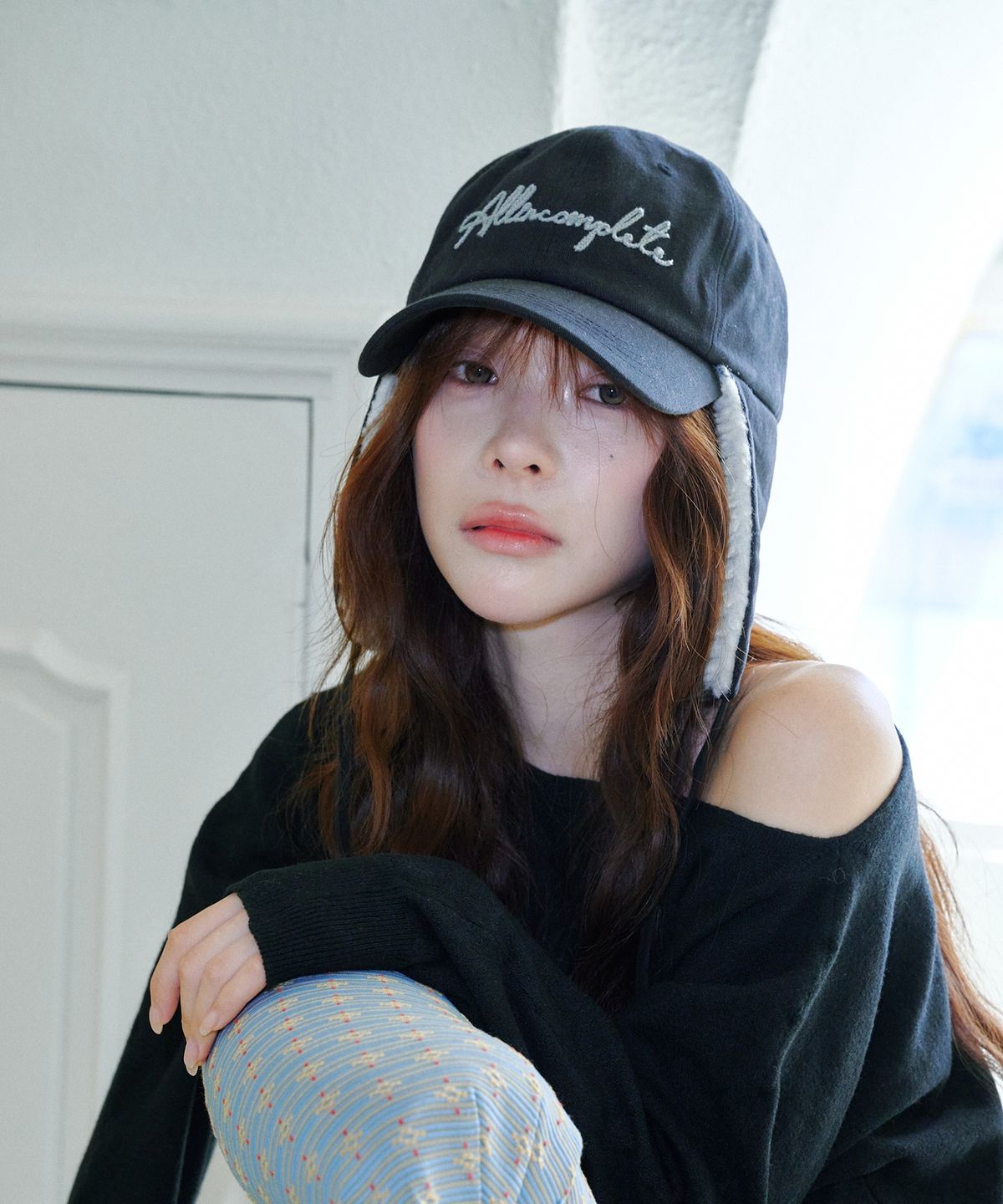 올인컴플리트(ALLINCOMPLETE) 달마시안 이어플랩 캡 (블랙)