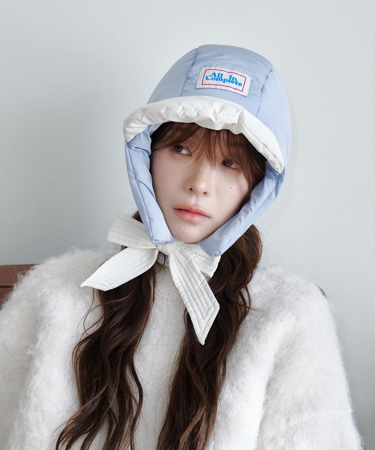 올인컴플리트(ALLINCOMPLETE) 판다 패딩 바라클라바 (아이보리 & 스카이블루)