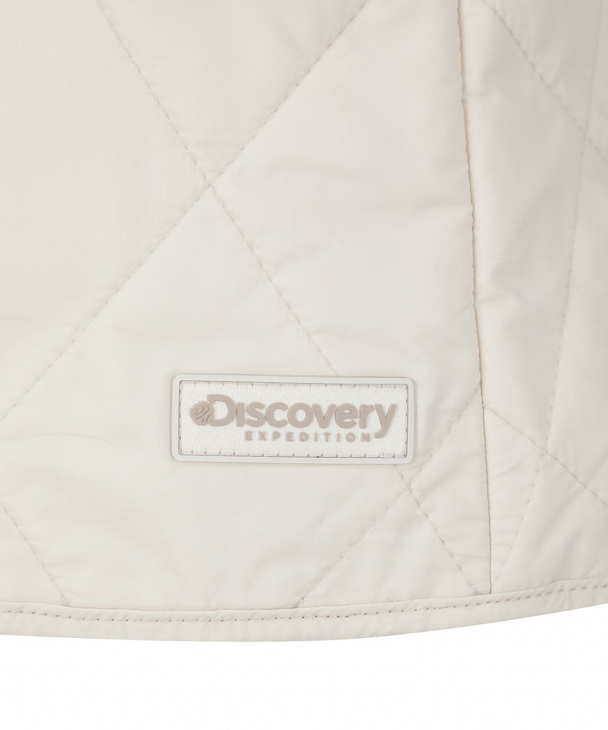 디스커버리 익스페디션(DISCOVERY EXPEDITION) 여성 패딩 랩 스커트 쇼츠 (D/IVORY)