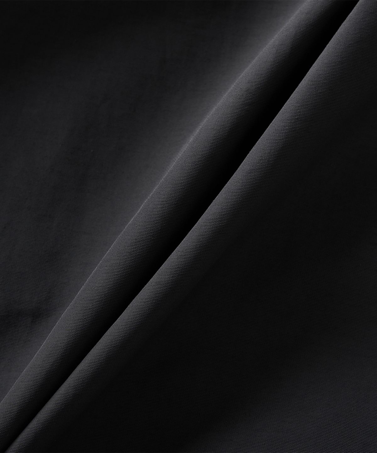 뉴발란스(NEW BALANCE) NBNAGCO303 / UNI 에센셜 스탠넥 우븐자켓 (CHARCOAL)