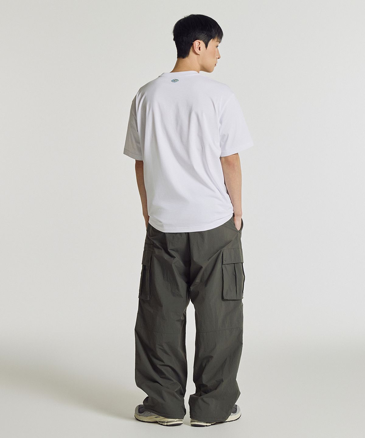 뉴발란스(NEW BALANCE) NBNEG21533 / UNI NB 프렌즈 지구 레터링 반팔티 (WHITE)