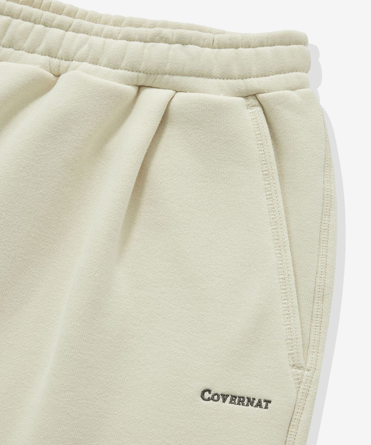 커버낫(COVERNAT) 루즈 스트레이트 플리티드 스웻 팬츠 크림