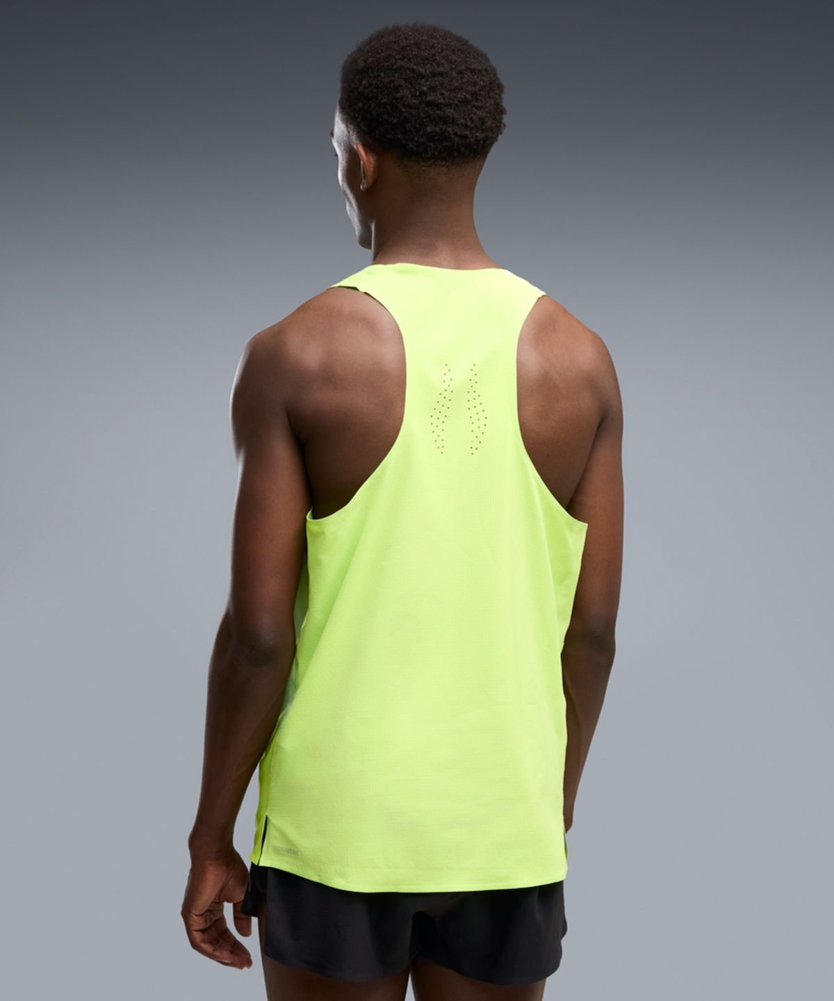 푸마(PUMA) 남성 라이트스피드 울트라위브 그래픽 싱글렛 - 써니 라임 / 528564-55