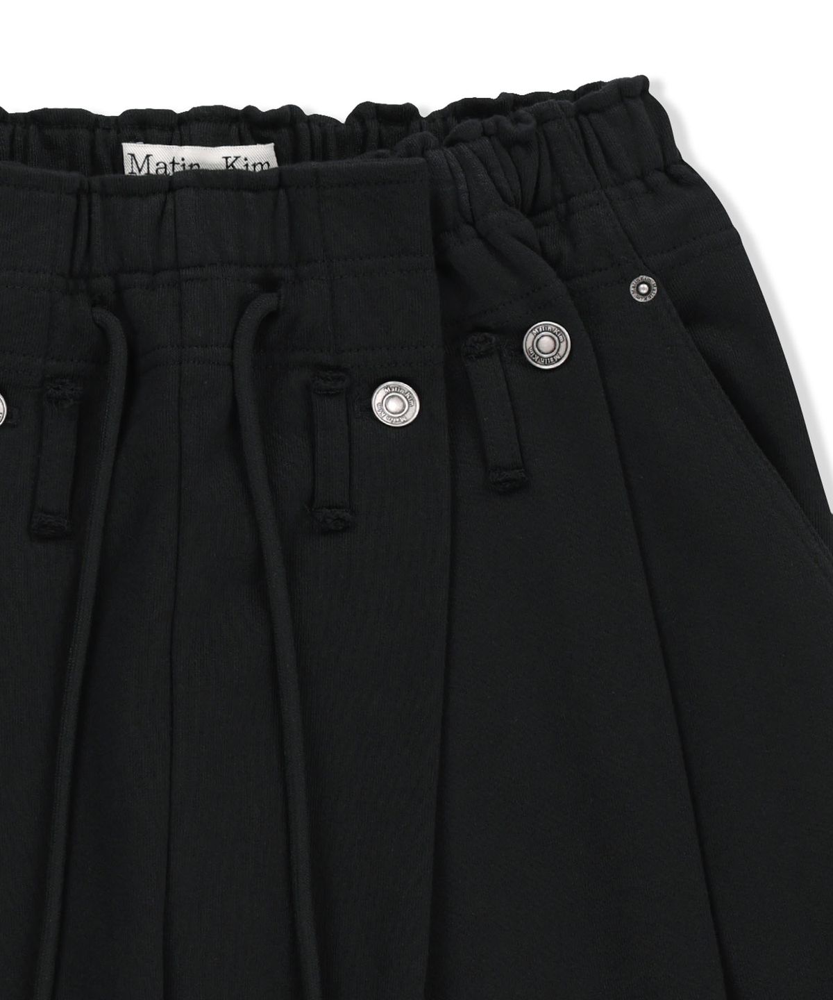 마뗑킴(MATIN KIM) SNAP TUCK WASHED SWEATPANTS IN BLACK