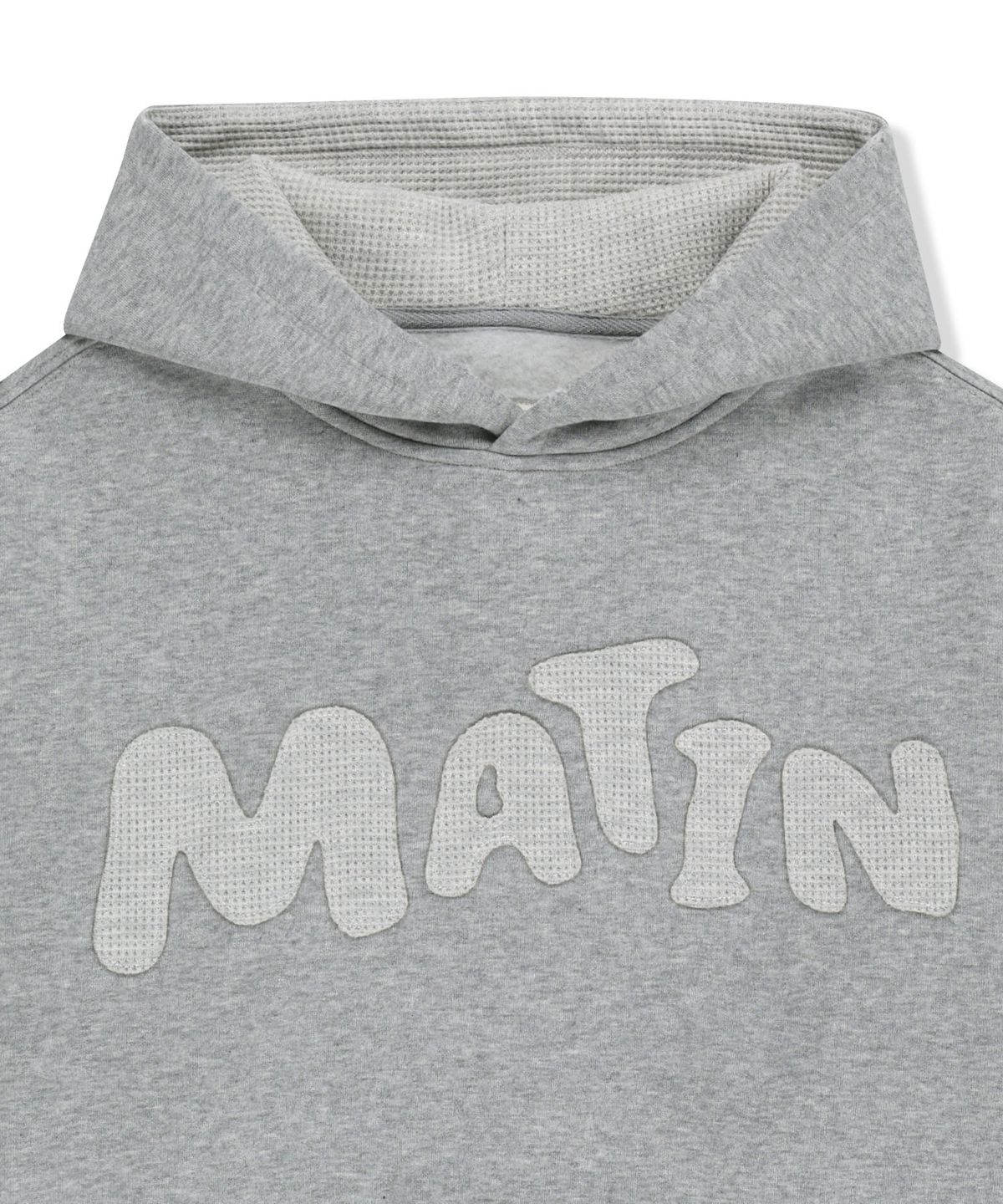 마뗑킴(MATIN KIM) WAFFLE APPLIQUE LOGO HOOD TOP IN GREY