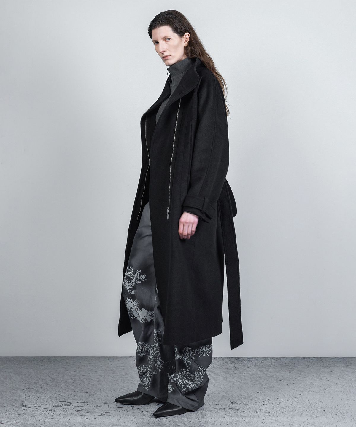 나체(NACHE) ASYMMETRIC ZIP WOOL LONG COAT BLACK