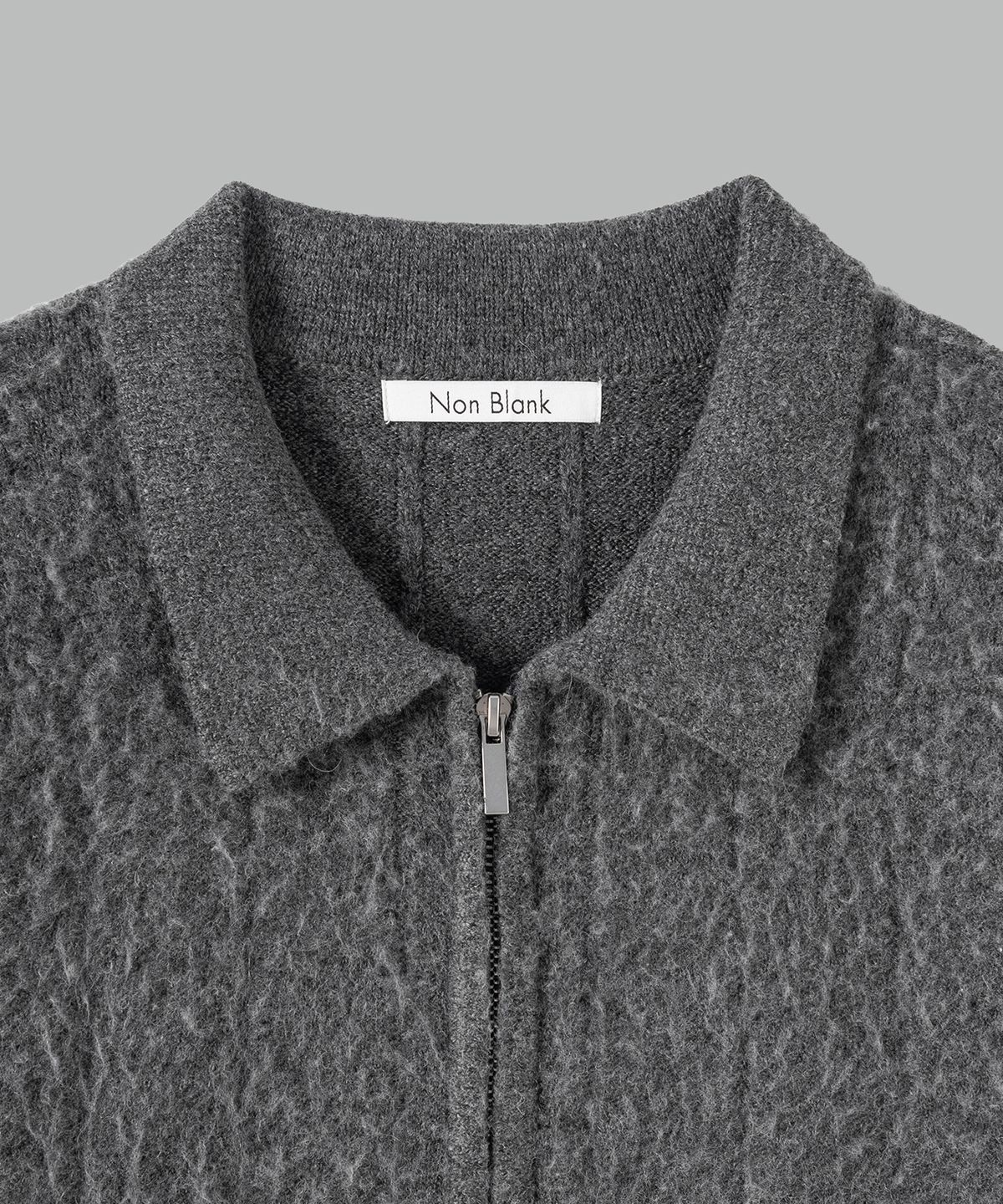 넌블랭크(NONBLANK) 브러쉬드 집 업 니트_DARK GREY