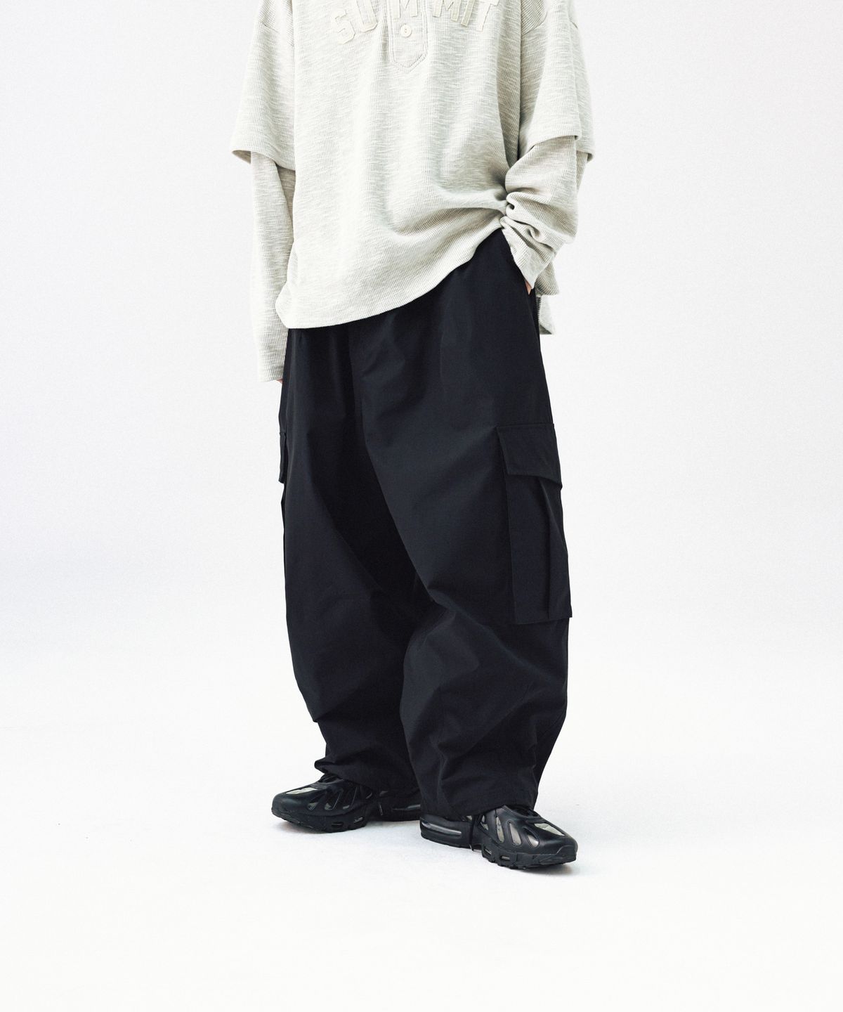앵글런(ANGLAN) Ripstop Snap Cargo Balloon Pants - Black