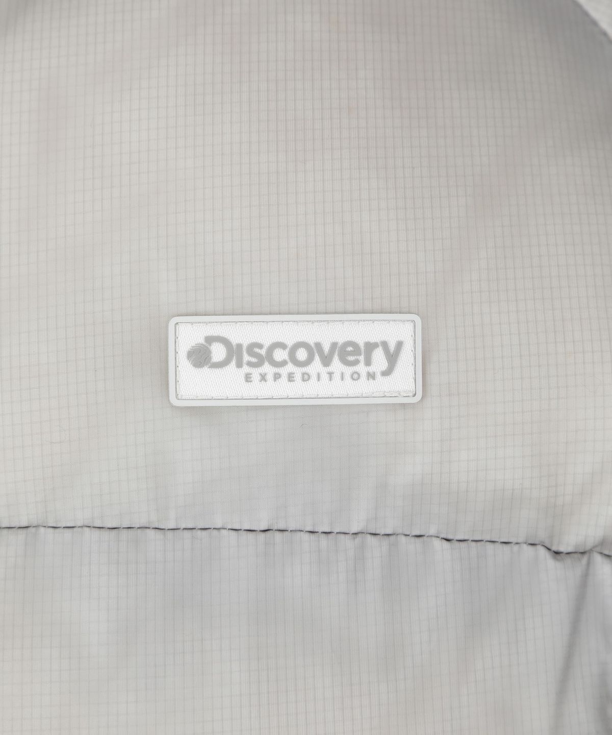 디스커버리 익스페디션(DISCOVERY EXPEDITION) 여성 올리아 글로시 다운 숏패딩 (L/GREY)