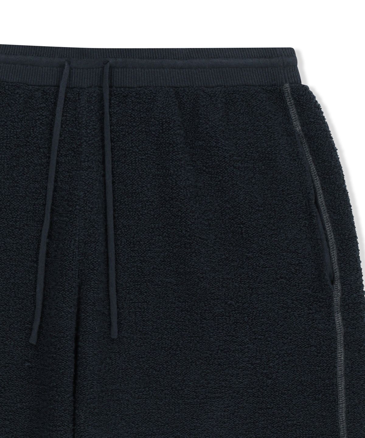 마뗑킴(MATIN KIM) BOUCLE TEXTURE KNIT PANTS IN DARK NAVY