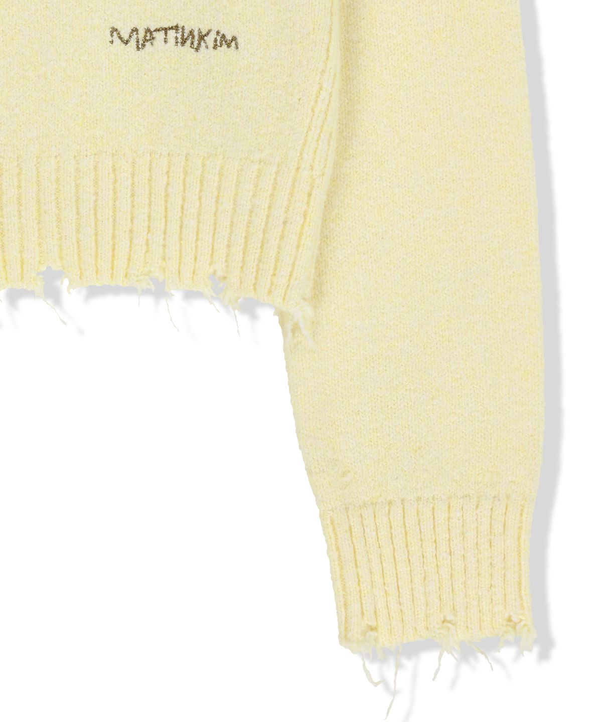 마뗑킴(MATIN KIM) DISTRESSED HEM V NECK KNIT PULLOVER IN LIGHT YELLOW