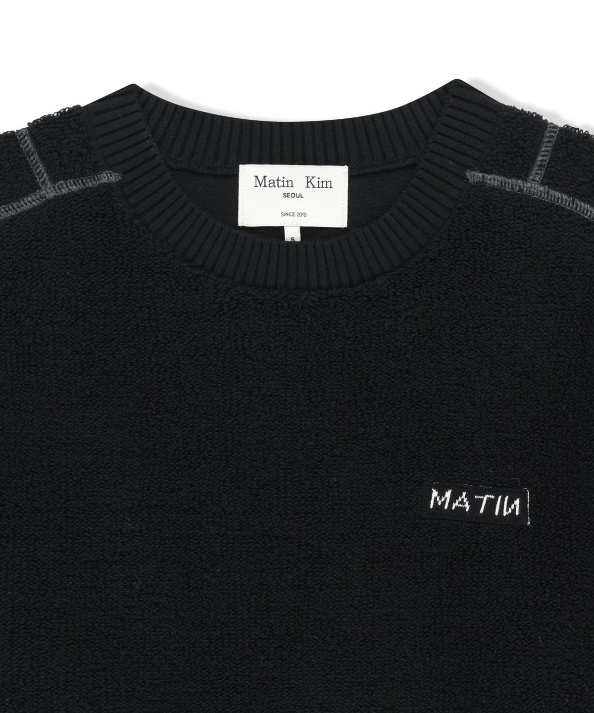 마뗑킴(MATIN KIM) BOUCLE TEXTURE KNIT PULLOVER IN BLACK