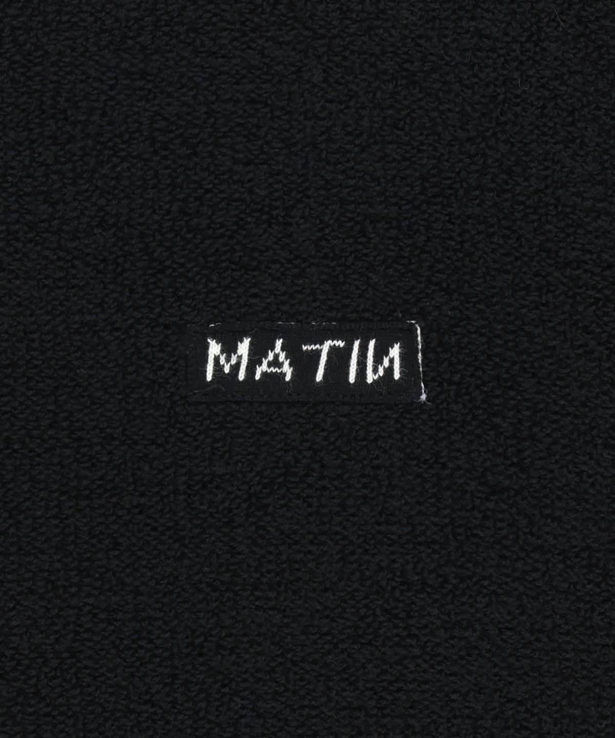 마뗑킴(MATIN KIM) BOUCLE TEXTURE KNIT PULLOVER IN BLACK