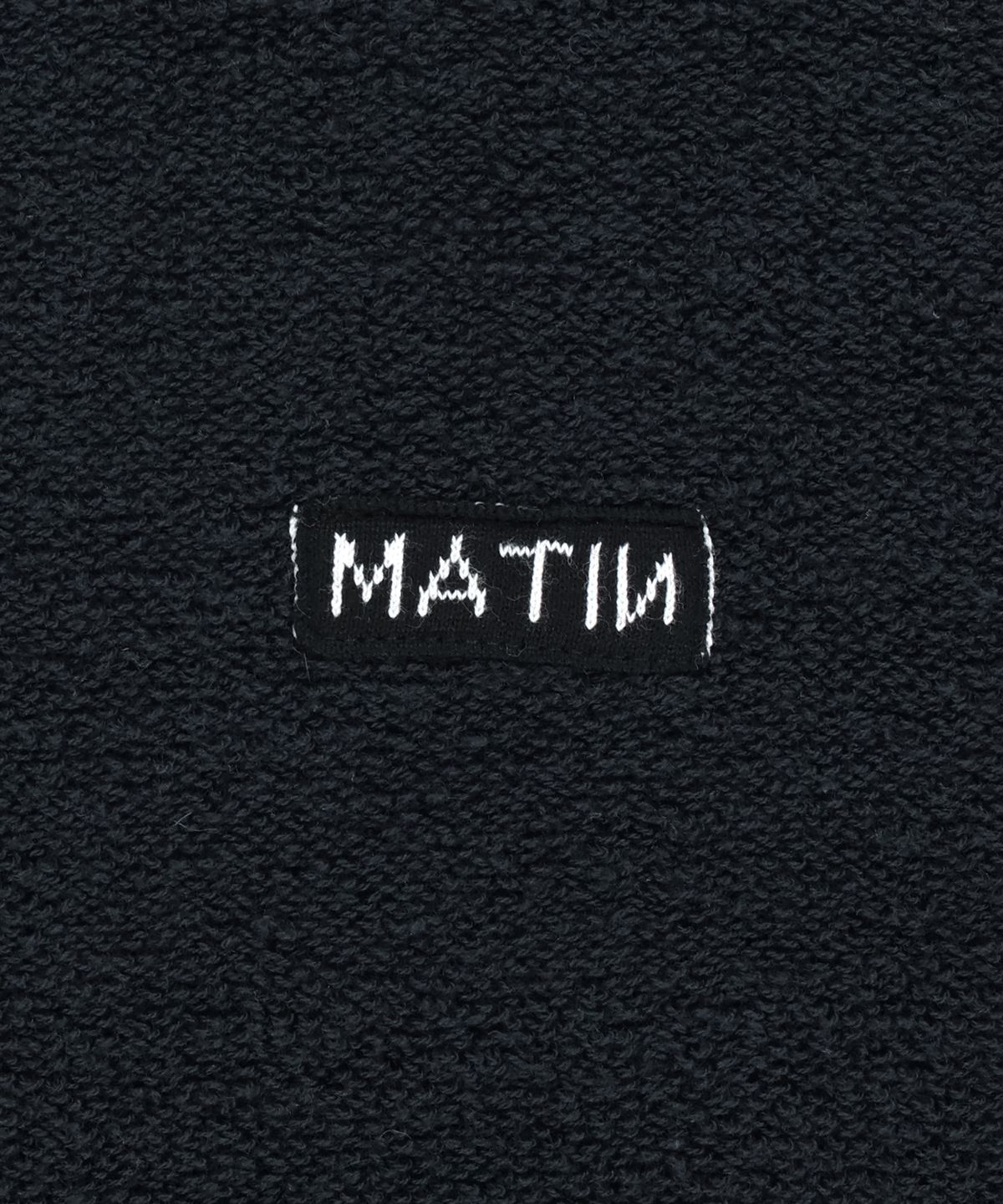 마뗑킴(MATIN KIM) BOUCLE TEXTURE KNIT ZIP UP IN DARK NAVY