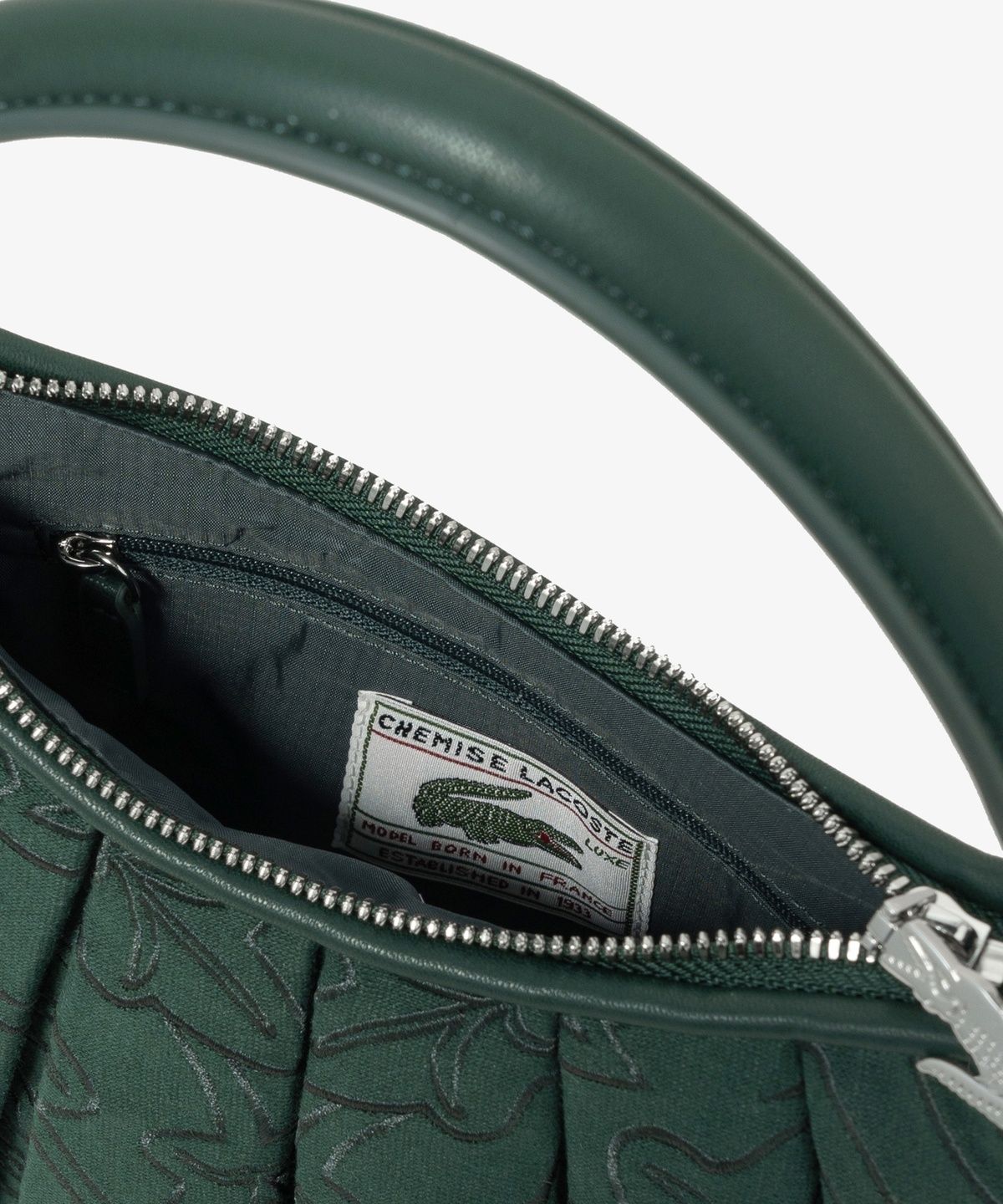 라코스테(LACOSTE) 여성 홀리데이 스몰 렝글렌 크로스바디 NU5472H56N B43