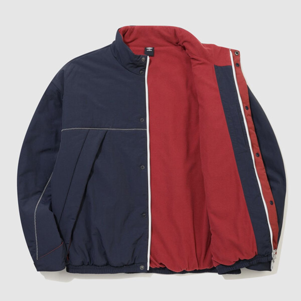엄브로(UMBRO) 더비클럽 논사시 스탠넥 패딩 봄버 자켓 네이비 UR321CPJ92