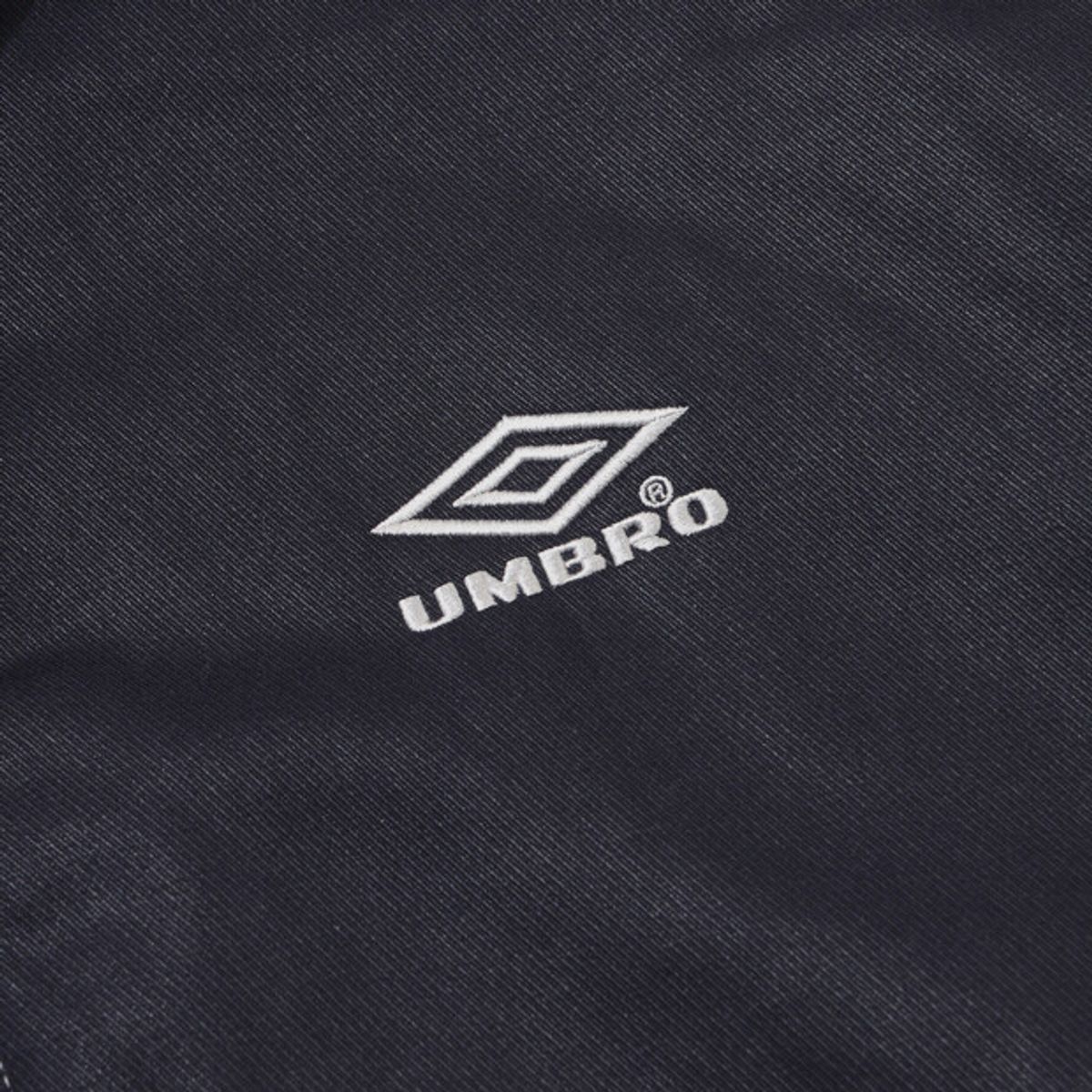 엄브로(UMBRO) 크리스피 타슬란 스탠넥 패딩 자켓 네이비 UR321CPJ91