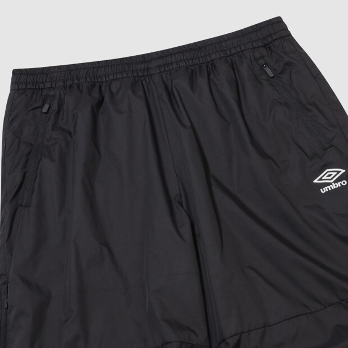 엄브로(UMBRO) 에어리움 경량 플리스 조거&스트레이트 2WAY 팬츠 블랙 UR321SPT93