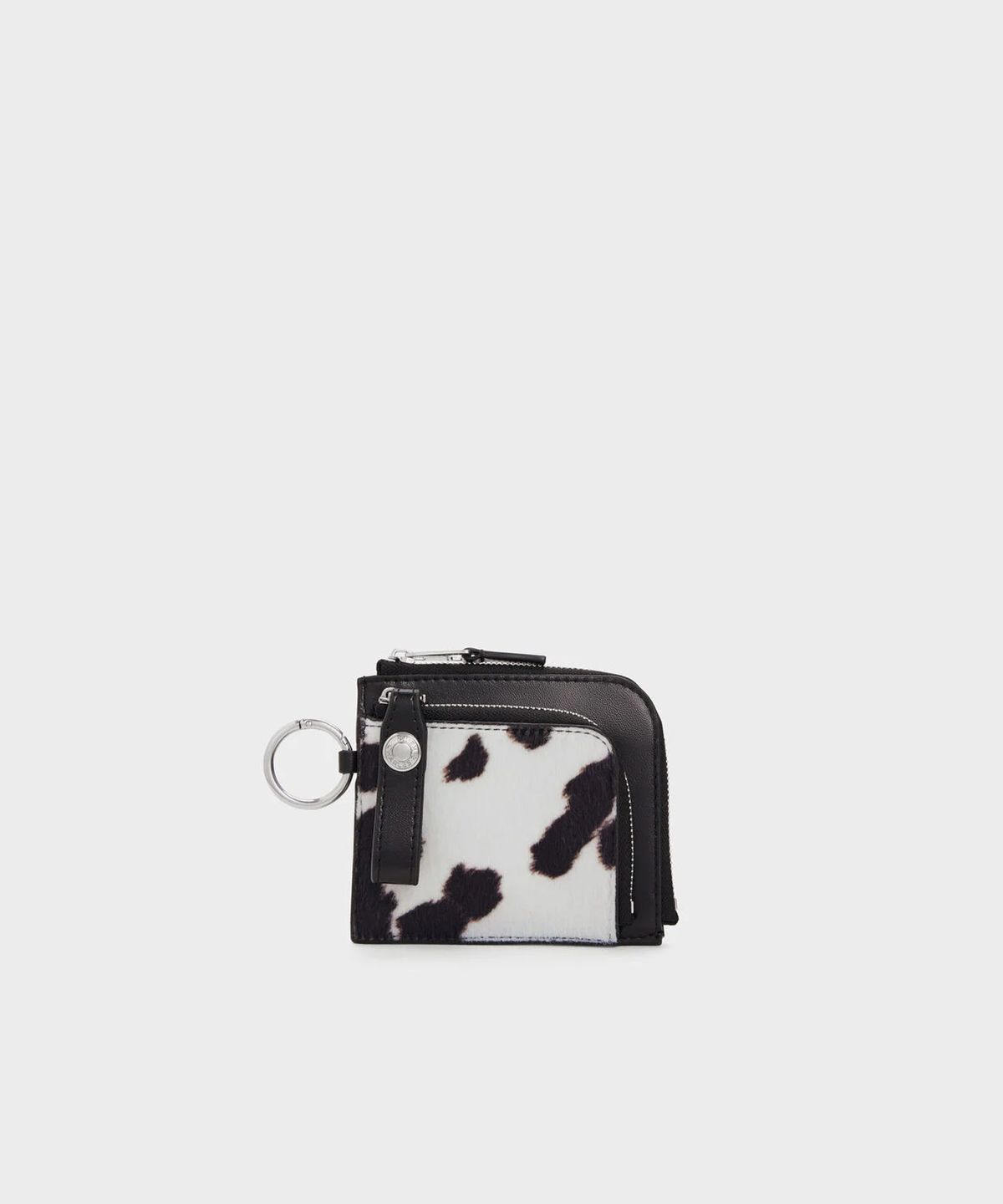 찰스앤키스(CHARLES & KEITH) 베가 퍼리 카우 프린트 지퍼 어라운드 파우치 CK6-10840677-A