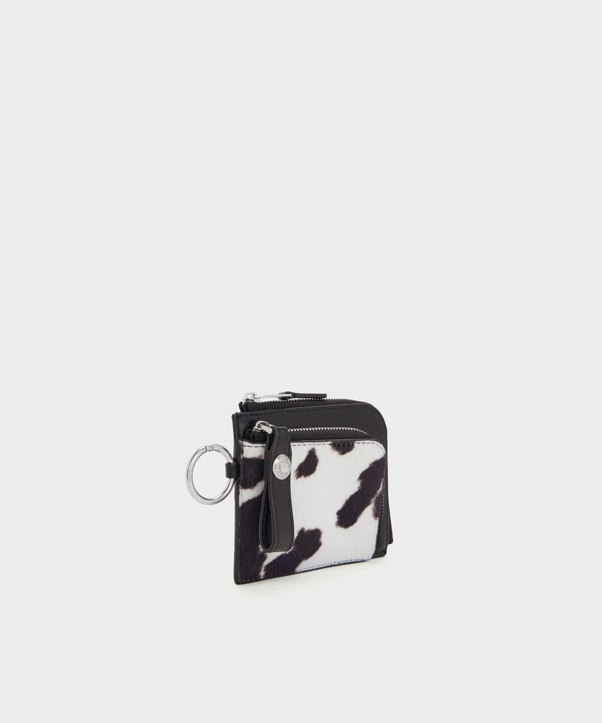 찰스앤키스(CHARLES & KEITH) 베가 퍼리 카우 프린트 지퍼 어라운드 파우치 CK6-10840677-A