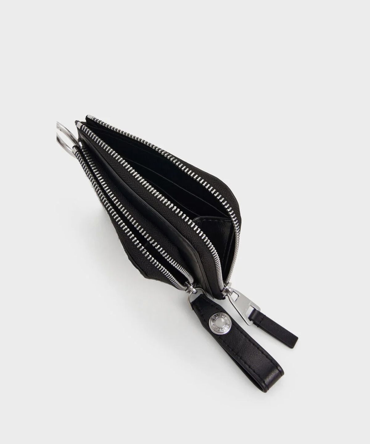 찰스앤키스(CHARLES & KEITH) 베가 퍼리 카우 프린트 지퍼 어라운드 파우치 CK6-10840677-A