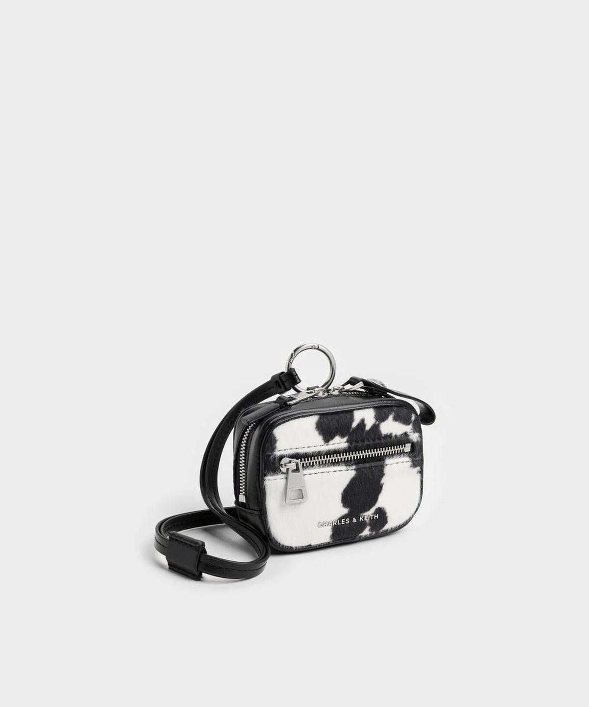 찰스앤키스(CHARLES & KEITH) 베가 퍼리 카우 프린트 마이크로 케이스 CK6-60840674-A