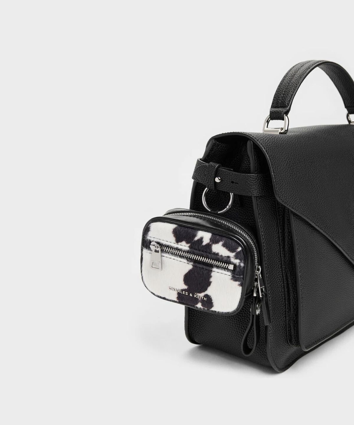 찰스앤키스(CHARLES & KEITH) 베가 퍼리 카우 프린트 마이크로 케이스 CK6-60840674-A