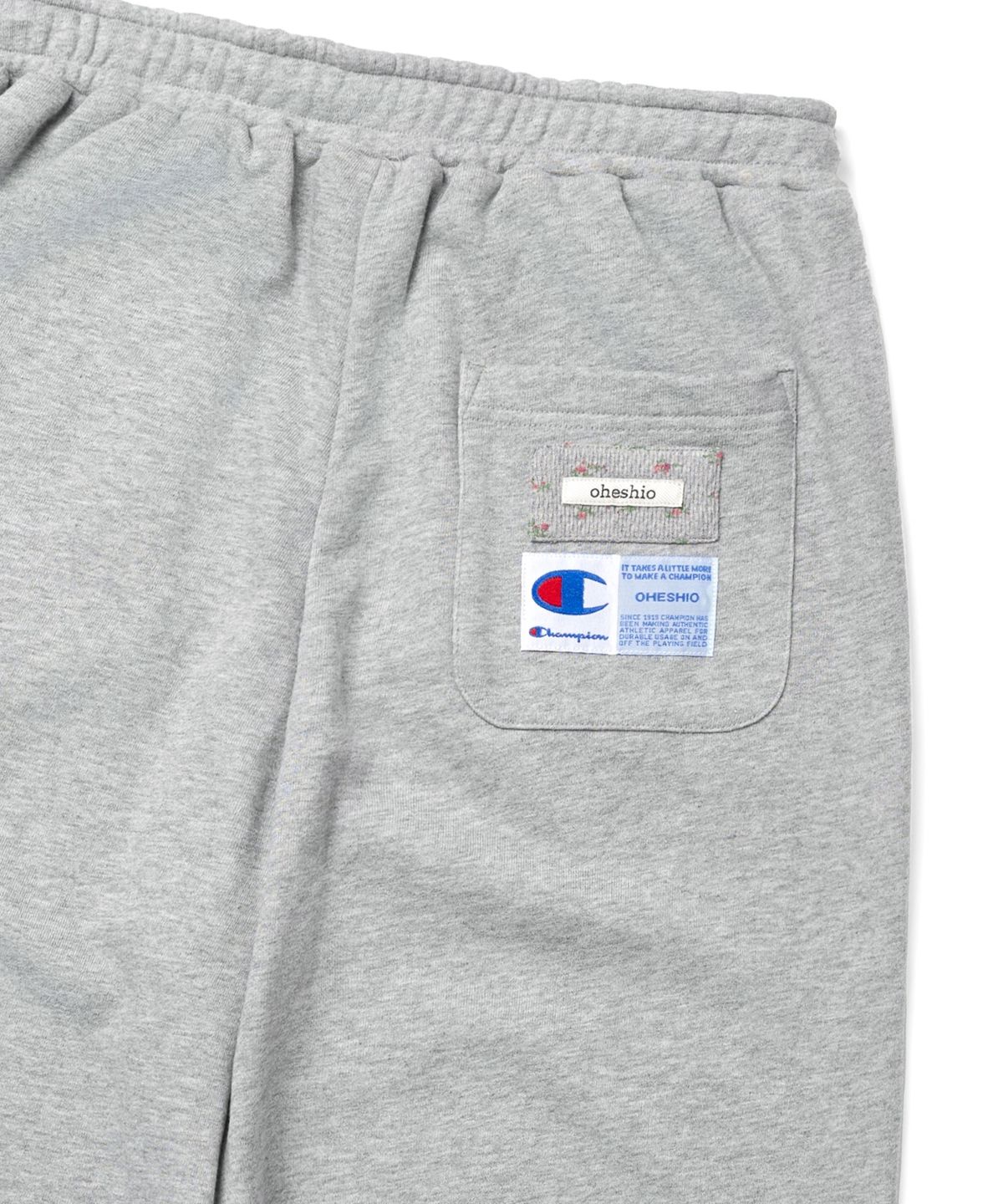 챔피온(CHAMPION) 챔피온 X 오헤시오 플라워 커프 밴딩 스웨트 팬츠 Melange Gray