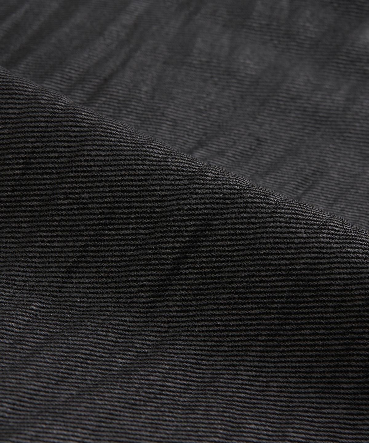 지제뮤지엄(ZIZEMUSEUM) EMBOSSED COATING BOOTCUT PANTS (BLACK)